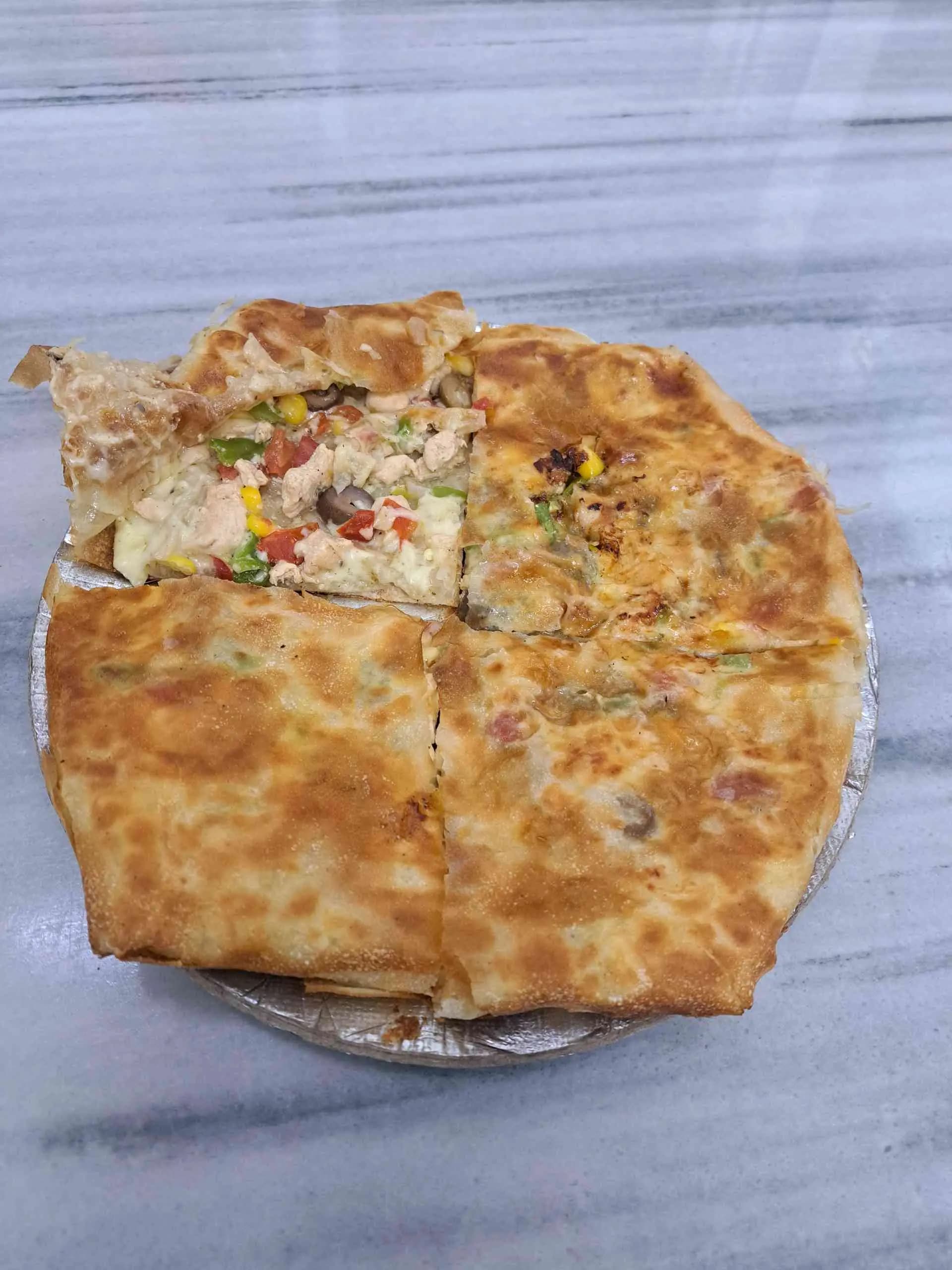 فطير وسط دجاج - صورة 1