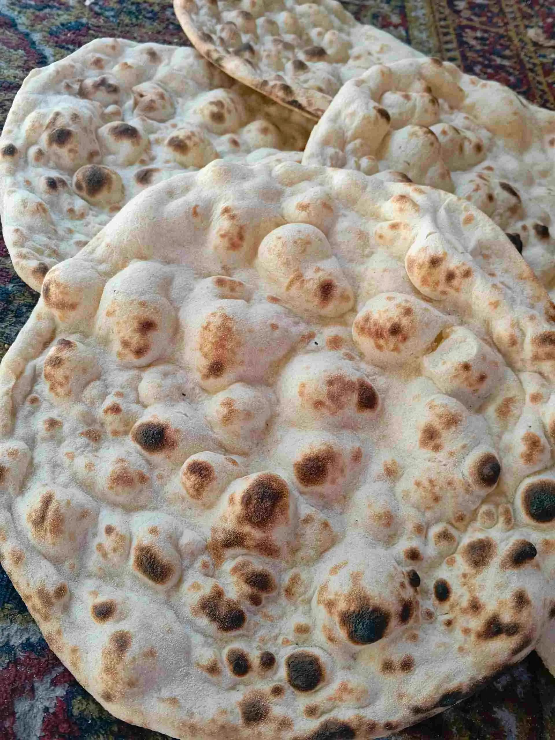 خبز تميس على التنور - صورة 3