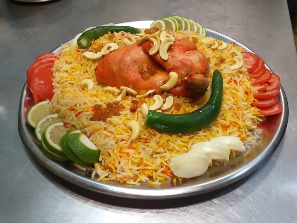 نصف حبة مندي - صورة 1